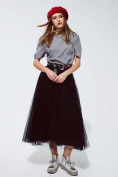 Discover the magic of our Black Tulle Midi Skirt, a piece that channels the elegance of a ballerina with the versatility for everyday style. Ballet-Inspired Elegance: This skirt's fluffy layers of soft tulle create a romantic, ethereal silhouette that echoes the grace of a dancer's attire. Comfort Meets Style: An elastic waistband ensures a snug, comfortable fit that adjusts to your body, allowing you to move freely and with confidence throughout your day. Material Mastery: Crafted from 100% pol Fluffy Tulle Skirt, Pink Sweater Dress, Tulle Skirt Black, Skirt With Elastic Waistband, Tulle Midi Skirt, The Ballerina, Black Tulle, Short Skirt, Chiffon Fabric