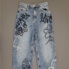 Never Worn, Fits Tight And Waist, Loose At Thighs. Casual Denim Bottoms With Graffiti Print, Spring Denim Bottoms With Graffiti Print, Blue Grunge Style Streetwear Bottoms, Blue Grunge Streetwear Bottoms, Trendy Graffiti Print Straight Leg Bottoms, Blue Relaxed Fit Grunge Bottoms, Blue Graphic Print Y2k Bottoms, Y2k Blue Bottoms With Graphic Print, Y2k Blue Graphic Print Bottoms