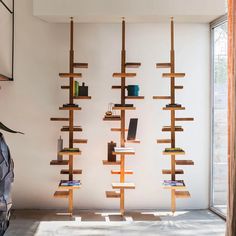 the bookshelf is made out of wooden planks