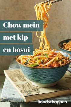 a bowl of chow mein noodles with chopsticks sticking out of it and the words chow mein met kip en bosui above