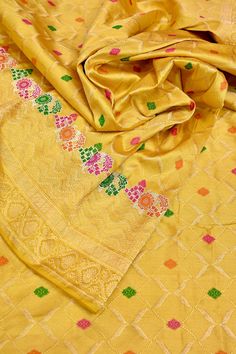 NVT-10240327 Semi-stitched Gold Anarkali Set With Motifs, Festive Brocade Sets With Meenakari, Yellow Semi-stitched Lehenga With Motifs, Semi-stitched Yellow Lehenga With Motifs, Festive Yellow Lehenga With Motifs, Festive Unstitched Meenakari Salwar Kameez, Festive Meenakari Salwar Kameez With Traditional Drape, Yellow Dola Silk Embroidered Fabric For Diwali, Semi-stitched Jamawar Sets With Motifs