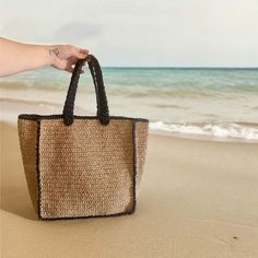 Embrace the summer vibes with our Handmade Straw Beach Bag, featuring elegant black striped.  Crafted with care, it is designed to be carried comfortably on the shoulder or by hand. Material: Eco-Friendly High-Quality paper yarn.  👙🏖️Perfect for beach outings, shopping trips, or daily use. Upgrade your summer style with this versatile and chic beach bag.  You can easily fit your personal items such as a towel, sunscreen, bikini, book, and magazine.  Get yours today and enjoy the perfect blend Summer Fashion Accessories, Paper Yarn, Straw Beach Bag, Beach Tote Bag, Book And Magazine, Bag Summer, Beach Tote Bags, Beach Tote, Beach Bag