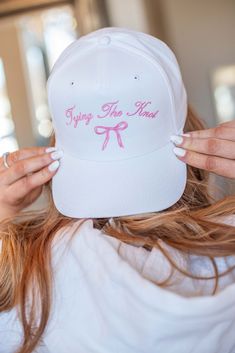 Just a little something cute for the bride to be. This white trucker hat features a pretty pink bow to tell everyone that you are getting married! White Adjustable Hat For Bachelorette Party, Adjustable White Mini Hats For Bachelorette Party, White Snapback Mini Hats For Spring, Cute Pink Wedding Hat, White Curved Brim Baseball Cap For Wedding, White Baseball Cap As A Spring Gift, White Baseball Cap As Spring Gift, White Trucker Hat, Four Sisters