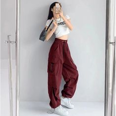 Features: Introducing the Women Punk Cargo Pants, perfect for the fashion-forward. Designed with a high waist and wide leg, these pants not only provide a flattering fit but also add a touch of streetwear edge to your wardrobe. Made with lightweight material, these pants are perfect for the summer season. Upgrade your style with these American Retro-inspired trousers. Fall Y2k High-waisted Pants, Y2k Wide Leg Pants With Belt Loops, Baggy Full-length Grunge Pants, High Waist Cargo Bottoms In Grunge Style, High Waist Grunge Bottoms With Cargo Pockets, Y2k High Waist Cargo Pants For Fall, Y2k Baggy Pants With Belt Loops, Y2k Full Length Parachute Pants For Fall, Y2k Baggy High-waisted Pants