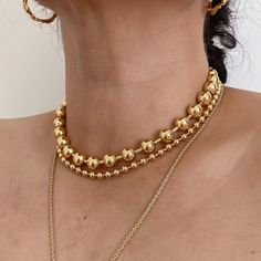 Introducing our exquisite 18K Gold Plated Stainless Steel Ball Chain Statement Necklace, a true embodiment of elegance. Crafted with precision, this necklace features a 5mm ball chain that is not only visually stunning but also resistant to tarnishing, ensuring its everlasting beauty. For reference, our model showcases the plain ball chain style at a length of 18 inches parting it with 17.5" 10mm ball chain. for the large ball chain please follow the link below https://www.etsy.com/listing/14934 Ball Necklace Gold, Formal Yellow Gold Ball Chain Jewelry, Elegant Gold Plated Necklaces With Ball Chain, Classic Gold Ball Chain Necklace, Ball Chain Choker Jewelry Gift, Ball Chain Choker As A Gift, Ball Chain Choker Jewelry As Gift, Gift Ball Chain Choker Jewelry, Elegant Gold-plated Ball Chain Jewelry