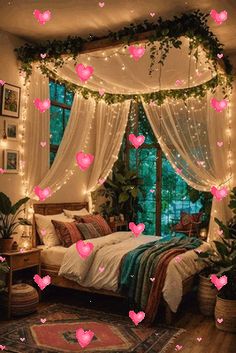 a bedroom decorated with pink hearts floating in the air