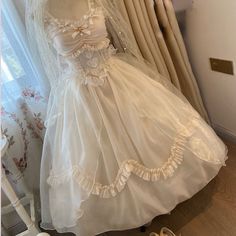 Brand Name: HnewlyType: Lolita DressesOrigin: Mainland ChinaCN: HunanSleeve Length(cm): SleevelessMaterial: PolyesterGender: WOMENSpecial Use: CostumesProduction location: Party Wedding DressProduct performance: Suspender Jsk DressScope of use: Elegant Trailing Dressesdress quality: excellent[23y 3m 15d] Princess Style Summer Mini Dress, Summer Princess Style Mini Dress, Summer Princess Mini Dress, White Fitted Fairy Dress For Dress-up, Cute White Vintage Party Dress, Sweet Sleeveless Fitted Dress, Sweet Fitted Sleeveless Dress, Summer Costume Party Dress With Lace Trim, Spring Princess Dress With Lace Patchwork