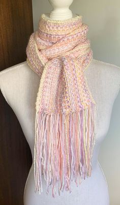 "Super long, beautiful knit scarf, in a variety of pinks, lilacs, whites, creams and peaches to make up this piece. Knit in a linen stitch to give the colours the chance to shine. Long enough to wrap a few times or just leave it long for a statement. This piece measures 16cm/6\" wide, 163cm/ 64\" long. Hand made, by me, who loves her work. Thanks for viewing my shop Lisa" Pink Scarves For Spring, One Size, Pink One Size Scarf For Spring, Pink One Size Scarves For Spring, Pink One-size Scarves For Spring, Pink Crochet Scarves, Pink Bohemian Scarves For Fall, Pink Bohemian Scarf For Fall, Handmade White Scarves For Spring, Handmade Multicolor Spring Scarves