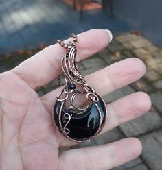 "A gorgeous black onyx crescent moon wrapped up in copper wire, a little crescent moon made from copper wire tucked in the frame, crystal and copper beads added for accent, then antiqued and hand polished. It measures about 2 1/4\" tall by 1 1/4\" wide and comes on a removeable pure copper bead chain, 16\" to 30\" lengths, also available in a 36\" length. This one is a stunner! It will arrive to you wrapped up pretty in a little box perfect for gifting or storing." Gold Moon-shaped Wire Wrapped Jewelry, Wire Wrap Crescent Moon Pendant, Moon Wire Wrapped Pendant, Black Bohemian Crystal Necklace Wire Wrapped, Black Wire Wrapped Crystal Pendant Necklace, Witchy Boho, Moon Made, Moon Halloween, Crescent Moon Pendant