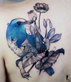 a blue bird sitting on top of a branch with leaves and flowers around its neck