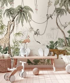 an animal themed children's room with wallpaper