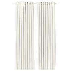 two white curtains hanging on the side of a window with long, thin pleated drapes