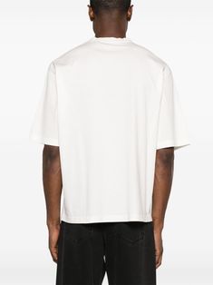 Find LANVIN X Future Eagle-print Cotton T-shirt on Editorialist. white/black cotton jersey texture embroidered logo to the front graphic print to the front crew neck short sleeves straight hem When buying this unisex item, keep in mind that it is graded in standard men's sizing. White Boxy Fit Crew Neck T-shirt, White Logo Print Cotton Jersey Top, White Cotton Jersey Top With Logo Print, White Cotton Jersey Tops With Logo Print, White Letter Print Cotton Jersey T-shirt, White Graphic Print Cotton Jersey Top, Modern White Cotton T-shirt, White Boxy Fit Graphic T-shirt, White Letter Print Cotton Jersey Top