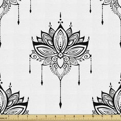 a black and white floral design with arrows on it's back ground, in the middle