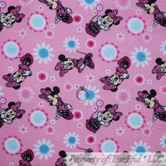 minnie mouse on pink fabric with flowers