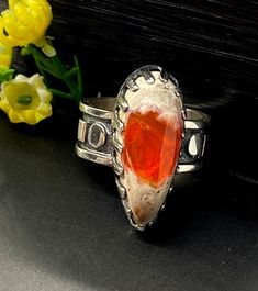 Mexican Fire Opal ring in sterling silver Hand-made Sterling Silver 925, size 10 Stones used: Mexican Fire Opal Face of the ring: Height-28mm, Width-11mm, Band-10mm Unique Handcrafted One-of a-kind Design Ring Each Piece of Jewelry in my Collection is Absolutely One of a Kind! When you start wearing a piece of my jewelry you will fall in love with it more and more each day and feel that good Energy and Love that I pass into it while creating this piece of Art. A piece of Art created for you to b Artisan Sterling Silver Ring With Polished Finish, Handmade Southwestern Opal Ring, Handmade Artisan Opal Ring In Sterling Silver, Artisan Rings With Polished Finish For Collectors, Unique Sterling Silver Oval Ring, Unique Oval Sterling Silver Rings, Unique Untreated Ring Jewelry, Artisan Untreated Open Ring Jewelry, Unique Hallmarked Sterling Silver Opal Ring