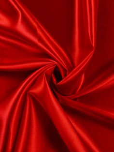 the red fabric is very soft and shiny