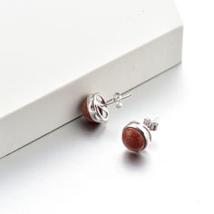 Lewa (Enduring Beauty) The Lewa earrings embody the simplicity of beauty that is timeless, featuring a significant gemstone that is encased within 9.2mm x 9.2mm sterling silver. Dimensions Earring size: 9.2mm x 9.2mm x 3.4mm Gemstone size: 8mm x 8mm Weight: 1.4g Material: 92.5% Sterling Silver Plating: Gold, Silver, Rose Gold Timeless Sterling Silver Earrings, Timeless Sterling Silver Pierced Earrings, Timeless Sterling Silver Jewelry With Matching Earrings, Sterling Silver Round Earrings Fine Jewelry, Sterling Silver Round Earrings With Polished Finish, Timeless Earrings With Polished Finish As Gift, Modern Silver Earrings With Birthstone, Modern Silver Birthstone Earrings, White Gold Sterling Silver Birthstone Earrings