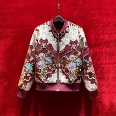 French Vintage Jacquard baseball Jacket, 3D Floral Embellished Jacket, Designer Streetwear beaded Jacket, Embroidery Rhinestone Applique Coat High-end custom collectible jacket coat. Custom Art Jacquard Fabric.Noble retro, Italian aesthetics, exquisite jacquard. The flower pattern comes from the European royal family,abstract intricate texture,the beautiful design is elegant and noble. The cloth surface is rich in style, the yarn color is varied and layered, and the visual effect is three-dimensional. Jacquard fabrics cost more than traditional fabrics,the craftsmanship is more complex, the quality and breathability are better, and it is more noble and retro. The most important is its unique style, the surface pattern presents a gradual and undulating shape, as delicate as a relief artwork Fall Outerwear With Embroidered Graphics And Long Sleeves, Fall Long Sleeve Outerwear With Embroidered Graphics, Spring Outerwear With Floral Embroidery And Stand Collar, Fitted Embroidered Varsity Jacket With Long Sleeves, Spring Varsity Jacket With Embroidered Graphics, Fitted Long Sleeve Embroidered Varsity Jacket, Floral Embroidered Stand Collar Outerwear For Spring, Embellished Red Outerwear For Fall, Red Embellished Outerwear For Fall