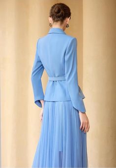 Say hello to that look of yesteryear with this Sky Blue Pleated Skirt Suit! Graceful and timeless, it features a full skirt, perfect for twirling and showing off your best dancing moves. Plus, you won't have to wait long to add it to your wardrobe - buy now and start showing off that sophisticated '50s style! Peak lapels; double-breasted V-neck, Long sleeves; button cuffs. Structured shoulders. Full pleated skirt with high waist Belted POLYESTER 100% Imported Brand - Aision Model: 233004 Elegant Blue A-line Skirt, Spring Formal Pleated Skirt Suit, Fitted Pleated Skirt Suit For Spring, Spring Fitted Skirt Suit With Pleated Skirt, Blue Flared Evening Dress, Blue Flared Skirt Evening Dress, Fitted Full Skirt In Light Blue, Light Blue Fitted Full Skirt, Elegant Pleated Skirt Suit For Spring