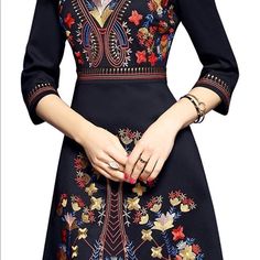 Beautiful Black Dress With Colorful Embroidery. Never Worn. My Loss, Your Gain! Elegant Embroidered V-neck Mini Dress, Black V-neck Midi Dress With Floral Embroidery, Elegant Floral Embroidered Dress For Fall, Black Long Sleeve Dress With Embroidered Neckline, Fitted Long Sleeve Dress With Embroidered Hem, Fitted Long Sleeve Embroidered Dress With Embroidered Hem, Fitted Embroidered Dress With V-neck, Elegant Fall Embroidered Midi Dress, Elegant Fall Midi Dress With Embroidery