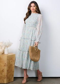 Beautiful floral midi dress with long sleeves, elastic wrist, smocked bodice, embroidery throughout, elastic waistband and tiered skirt with ruffle detailing. Shell 100% Polyester, Lining 100% Rayon Hand wash in cold. Aprox. measurements in inches: S:Length-48.5 |Bust-28 |Waist-26 M:Length-49 |Bust-30 |Waist-28 L:Length-49 |Bust-32 |Waist-30 modest dresses, modest dress, modest midi, modest maxi, modest fashion, modest trendy dresses, modest boutique, modest attire, modest clothing, modest tops, Modest Midi Length Smocked Dress, Modest Short Sleeve Midi Dress With Smocked Back, Modest Mid-length Dress With Smocked Back, Modest Midi-length Smocked Summer Dress, Modest Midi-length Smocked Dress With Floral Print, Modest Attire, Modest Boutique, Modest Midi Dress, Fashion Modest