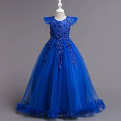 Expertly crafted with delicate lace and tulle fabric, this A-line floor length dress in blue is perfect for any occasion. Featuring a charming round neckline and elegant cap sleeves, it is finished with a back zipper and tie back bow for a secure and comfortable fit. Make your little girl feel like a princess with this stunning lace embellished dress. Kids African Dresses, Violet Sapphire, Children Clothes Boys, Boy Baby Shower Gift, Garden Party Dresses For Women, Kids Costumes Girls, Dresses For Women Over 50, Tulle Flower Girl Dress, Kids Costumes Boys