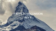 a mountain with the words 7 keys to ascension key on it's side in front of a cloudy sky