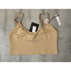 New With Tags Forever 21 Size Small/Medium Material: 93% Nylon/Polyamide 7% Spandex/Elastane Comes From Smoke Free & Pet Free Home Trendy Beige Crop Top With Built-in Bra, Fitted Seamless Beige Sports Bra, Fitted Beige Seamless Sports Bra, Fitted Beige Sports Bra With Built-in Bra, Fitted Beige Sports Bra With Removable Pads, Seamless Beige Bra For Spring, Lace Brallete, Sequin Bra, Lingerie Cute