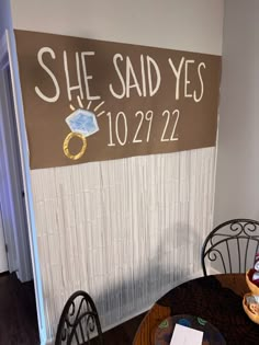 there is a sign that says she said yes to her husband on the side of the wall