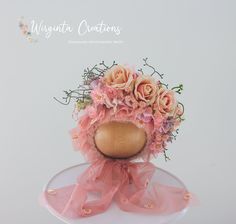 Get ready to be charmed by our darling handmade knitted bonnet, made with love for little ones aged 6-12 months! Adorned with delightful artificial flowers, this beautiful bonnet isn't just another pretty piece--it's the ideal touch for your baby's photo sessions. And in lovely peach and pink hues, it adds a soft, sweet touch to every precious memory you capture. Sizes Available: 6-12 months old. Hand-knitted. Colour: Peach, Pink. Decorated with artificial flowers. Photography prop, not suitable Handmade Cute Pink Bonnet, Cute Handmade Pink Bonnet, Handmade Adjustable Pink Bonnet, Knitted Bonnet, Peach Pink, Handmade Knitting, Flowers Photography, Photography Props, Baby Photos