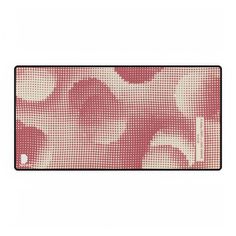 a pink and white pattern on a computer mouse pad