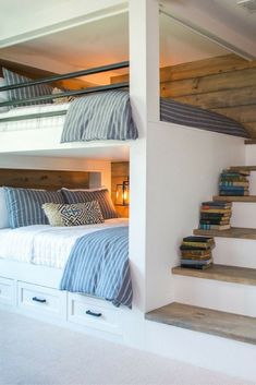 bunk beds with built in bookshelves next to each other