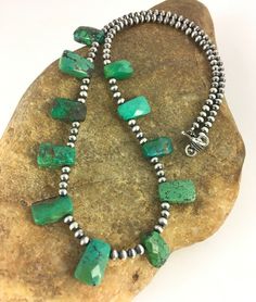 Masha Indian Native American Jewelry   -On Route 66 -         Albuquerque, New Mexico U.S.A     Item Specifics            Stone : Turquoise Size : 20" Color : Green SKU : 8867 Free gift with Purchases (Till Stocks Last)  Genuine Sterling Silver Jewelry  This beautiful Necklace is made from all 925 Sterling Silver Beads and Findings.  These Beads are meticulously hand strung and assembled by the artist creating the perfect balance of fall, color and shine. Necklaces are a must have for any collection, whether you are just starting out or are a serious collector you will not be disappointed with this work of art. These necklaces have excellent fall and can even be stacked with others, fashioned with a pendant or worn double wrapped to give you different look every time.    Authenticity you c Southwestern Green Turquoise Necklace, Antique Turquoise Jewelry, Turquoise Necklaces, Artisan Jewelry Necklaces, Antique Turquoise, Albuquerque New Mexico, Southwestern Jewelry, Handcrafted Artisan Jewelry, Vintage Navajo