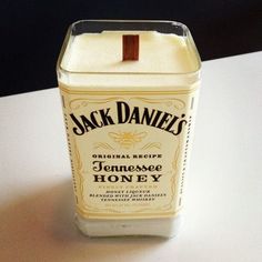 a jar of jack daniels honey sits on a table