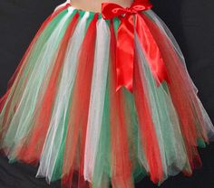 "Lengths Above knee 12\"-14\" Knee length 22\"-24\" Made with the holiday season in mind, this beautiful well crafted Multi color tutu is Handmade from 100% Polyester High Quality Tulle. Soft, Comfortable 1 inch Elastic Waistband. Lightweight and fun to wear. Can be Used as Casual or Formal Wear. Available in your favorite colors as well, please leave a note with your color choices in the message box provided. Thanks" Gold Tree Skirt, Rustic Tree Skirt, Tulle Christmas Trees, Pink Xmas Tree, Girl Christmas Card, Tutu En Tulle, Mesh Christmas Tree, Tulle Crafts, Faux Fur Tree Skirt