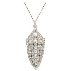 Exquisite Art Deco Platinum, Diamond and Emerald Lavaliere on Platinum & Diamond chain. Wow! Reticulated for that subtle shimmering reflection of light. Measurements are for pendant only. Where is the Great Gatsby now? Vintage Diamond Necklace, Fancy Necklaces, Art Deco Emerald, Elven Jewelry, Art Deco Jewellery, Necklaces Pendant, Solitaire Pendant Necklace, Diamond Jewelry Necklace, Family Jewels