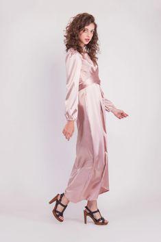 Feel more confident than ever before in the Satin Wrap Maxi Dress with Puff Sleeves that combines modesty with today’s most current modest fashion trends. The sleek satin maxi dress accentuates the waist with a luxurious wrap design while the puff sleeves accent a bold shoulder and feminine shape.Perfect for every special occasion, the unique dress comes in multiple colors to best fit your individual personality. Satin Belted Midi Dress For Party, Party Satin Midi Dress With Belt, Long Sleeve Satin Belted Dress, Long Sleeve Satin Dress With Belt, Feminine Satin Maxi Dress For Brunch, Spring Full-length Satin Maxi Dress, Full-length Satin Maxi Dress For Spring, Spring Full Length Satin Maxi Dress, Full Length Satin Maxi Dress For Spring