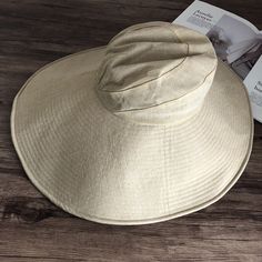 Introducing our Elegant Japanese-Inspired Extra Large Brim UV Protection Sun Hat, the perfect blend of style and functionality. Designed to provide maximum sun protection while maintaining a chic and sophisticated look, this hat is an essential accessory for any outdoor occasion. High-Quality Material: Made from premium linen for durability and breathability. Extra Large Brim: Front brim measures approximately 14.5 cm, back brim approximately 18.5 cm. 360-Degree Sun Protection: Provides full cov