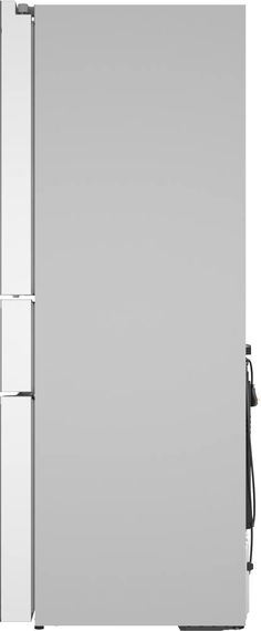 a white refrigerator freezer sitting on top of a counter