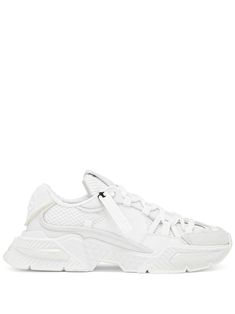 Airmaster panelled low-top sneakers from DOLCE & GABBANA featuring white, logo-embossed patch to the rear, logo patch to the side, branded insole, logo at the sole, round toe, slip-on style, front lace-up fastening and ridged rubber sole. | Dolce & Gabbana Airmaster panelled low-top sneakers Dolce Gabbana Shoes, Dolce E Gabbana, Nike Huarache, Fashion Wear, White Sneakers, Golden Goose Sneaker, Sneakers White, White Sneaker, Air Jordan Sneaker