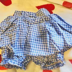 Cute Little Poofy Gingham Skort With A Bow On The Front And Back Shirring For Comfort! Perfect For A Kawaii Outfit On Its Own, But Just As Great For Lounging, Sleeping, Or Wearing Under Something Else For Modesty. These Are New With The Tag From A Small Chinese Brand Bought Directly From The Chinese-Only Shopping Site, Taobao. They Were Only Removed From The Package For Pictures. Us Size Xs-S. Cute Spring Bloomers, Plaid Cotton Bottoms For Picnic, Summer Cotton Gingham Shorts, Gingham Cotton Summer Shorts, Summer Gingham Cotton Shorts, Cute Light Blue Cotton Bottoms, Blue Cotton Bloomers With Ruffles, Cute Cotton Bloomers For Spring, Preppy Gingham Cotton Bottoms