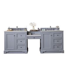 an image of two sinks in the middle of a vanity with drawers on each side