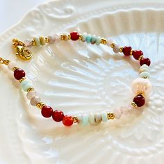 Add a pop of color and natural beauty to your outfit with our Bohemia Colorful Beaded Bracelet. Handcrafted with natural stone and freshwater pearls, each bracelet is a unique piece that captures the vibrant colors of autumn. Elevate your style and connect with nature with this stunning bracelet! Dimensions: 17.5cm+5cm Materials: Natural stone, freshwater pearl, 18k gold-plated brass Bohemian Pearl Bracelet With Gemstone Beads, Bohemian Pearl Bracelet With Natural Stones As Gift, Pearl Beaded Bracelets With Natural Stones, Multicolor Pearl Bracelet With Gemstone Beads, Hand-strung Bohemian Pearl Beaded Bracelets, Bohemian Pearl Bracelets As Gift, Bohemian Hand-strung Pearl Beaded Bracelets, Natural Stone Pearl Beaded Bracelets, Bohemian Pearl Bracelet Gift