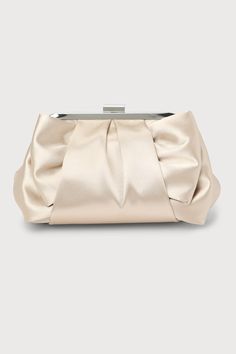 Elegant Plus OneThis glossy satin clutch is ready to RSVP in style with its flexible exterior, complete with a folded bow-like detail that lends an ultra-chic aesthetic. Open the silver top clasp closure to reveal a lined interior for your most precious essentials. Detachable silver chain strap. Lined. Bag Measures 8. 5" Wide, 6. 5" Tall, And 2" Deep (Relaxed). 47. 5" Detachable Chain Strap. Strap Has A Drop Measurement Of 23. 5". Shell: 100% Polyester. Imported. Lulus | Something Special Champa Elegant Satin Rectangular Bag, Elegant Rectangular Satin Bag, Elegant Wedding Bags With Bow Detail, Elegant Wedding Bags With Bow, Elegant Clutch Bag With Bow, Elegant Satin Clutch Bag, Elegant Bags With Bow For Events, Rectangular Bag With Bow For Events, Rectangular Event Bag With Bow Detail