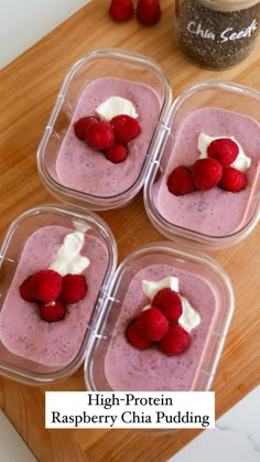 four glass containers filled with raspberry chia pudding