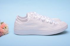 All orders for trainers / sneakers to USA/Canada will be delivered in 2-4 business days after production without extra costs Made with love for your wedding day by Lovin Bridal - More Wedding shoes at our shop : http://lovincollection.etsy.com White Lace Pearl Wedding Converse for Wedding. Every bride wants a wedding day that is filled with things that mean something to her and her husband to be. It's the bride's prerogative to wear the comfiest wedding shoes. If you're set on heels then one opt Converse For Wedding, Customised Converse, Sneakers For Bride, Pearl Converse, Lace Converse, Wedding Sneakers For Bride, Sequin Converse, Bride Converse, Rhinestone Converse