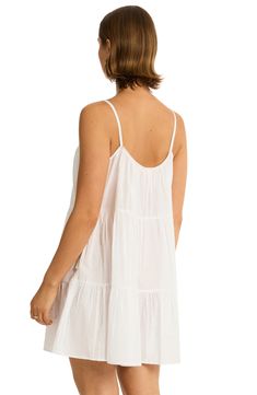 Lightly textured cotton details a breezy minidress in a swingy silhouette that can be worn beachside or to your next dinner date. Slips on over head Scoop neck Sleeveless 100% cotton Hand wash, line dry Imported Sleeveless Cotton Mini Dress For Beach Cover-up, Chic Cotton Sundress For Beach Season, Summer Beachy Cotton Sundress, White Cotton Mini Dress For Vacation, Chic White Cotton Beach Dress, Cotton Beachwear Mini Dress For Day Out, Flowy Breezy Cotton Beach Dress, Flowy Cotton Beach Dress, Cotton Sundress With Adjustable Straps For Vacation