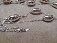 Vintage AVON jewelry collection Gorgeous silver oval beaded pendant chain necklace Well used Ready to ship! Silver Necklaces With Polished Beads, Oval Silver Chain Metal Necklace, Oval Silver Chain Necklace, Nickel-free Oval Silver Necklace, Oval Nickel-free Silver Necklace, Silver Oval Metal Necklace, Silver Jewelry With Beaded Chain And Oval Beads, Elegant Necklaces With Silver Oval Beads, Elegant Necklace With Silver Oval Beads