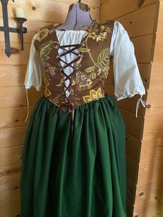 3 piece set includes front lacing bodice, chemise shirt, and petticoat with pocket slots ( pockets sold separate) . This is a medium top fits a bust 33-37 as it is adjustable. No refunds or exchanges all sales are final. Cotton Dresses For Larp, Medieval Cotton Fitted Dress, Fitted Petticoat For Costume, Medieval Style Fitted Cotton Dress, Cotton Dress With Fitted Bodice, Fitted Gathered Petticoat For Costume Party, Fitted Petticoat With Gathered Skirt For Costume Party, Fitted Peasant Dresses For Larp, Fitted Cotton Dresses With Underbust Design